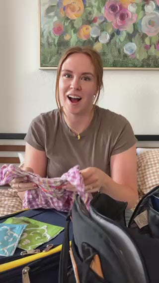 Mom shows AIRLINEPOPS travel lollipops, then her toddler and baby enjoy them on a flight